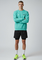 Layer Men’s Track Club Sweatshirt in teal – front view showing modern athletic silhouette and subtle branding