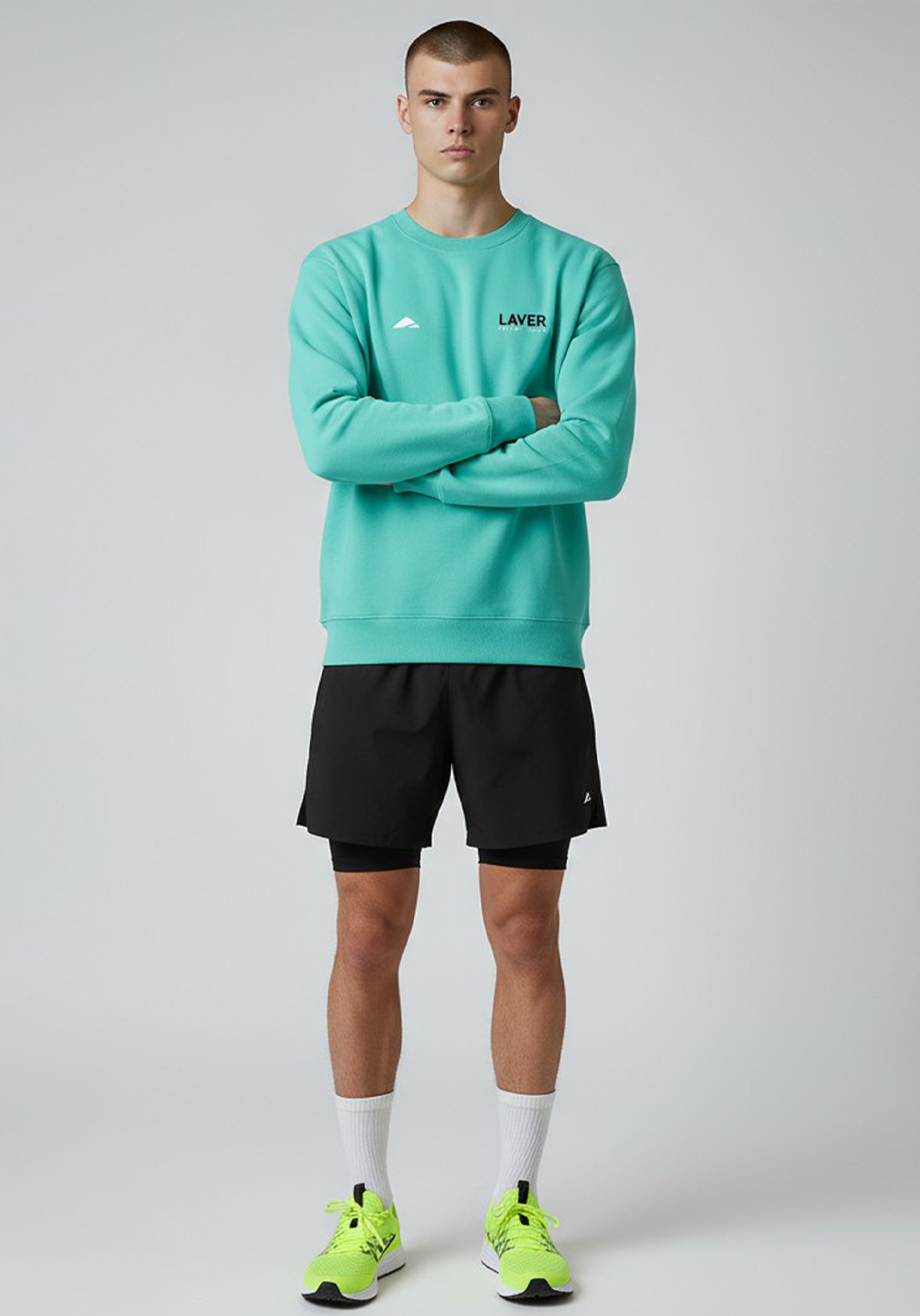 Layer Men’s Track Club Sweatshirt in teal – front view showing modern athletic silhouette and subtle branding
