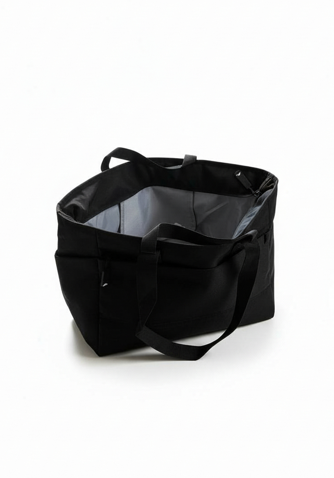 Layer Trackside Tote open view showing spacious main compartment for gym and track training kit