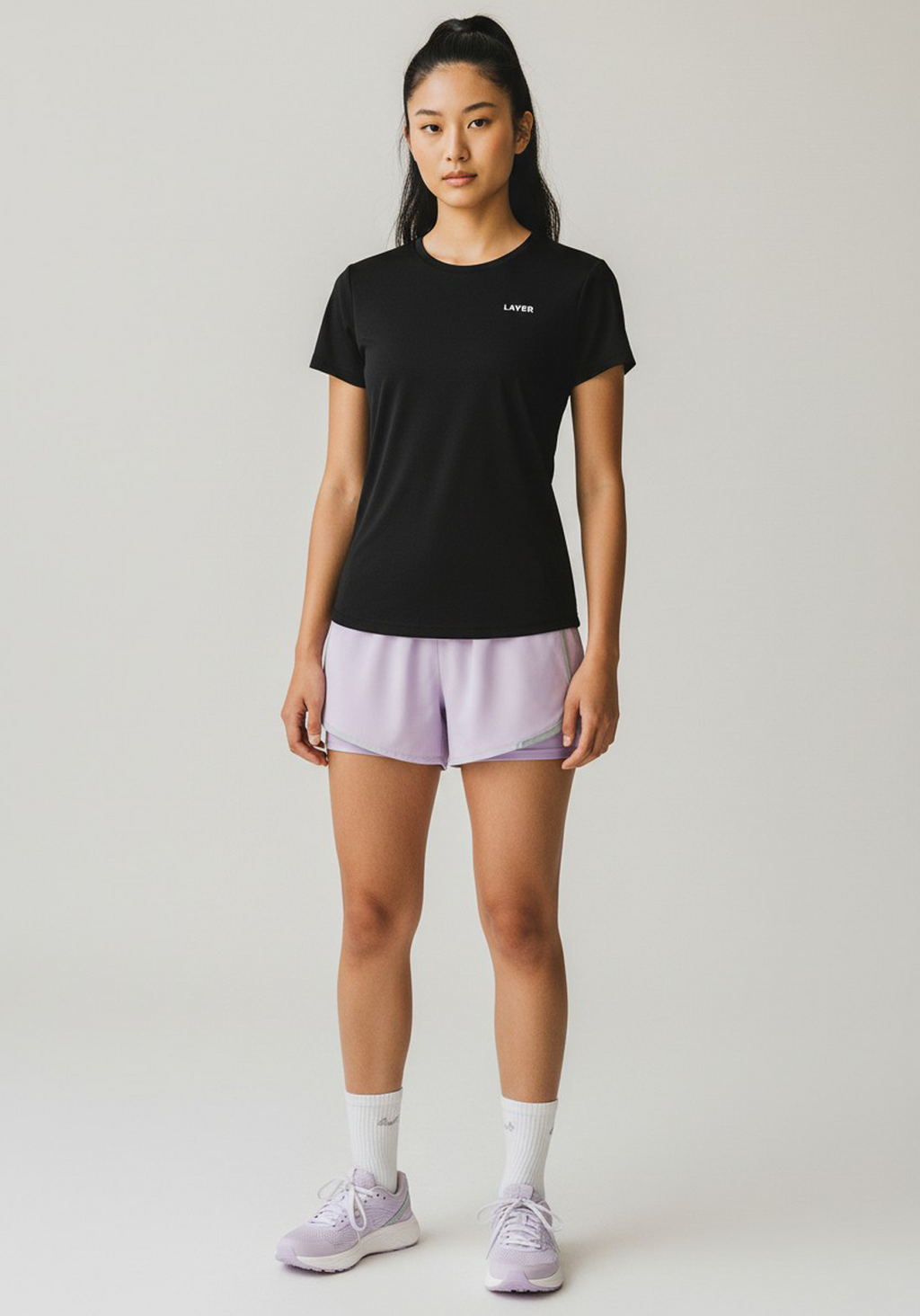 Full front view of black Women’s FTR Graphic Running Tee designed for everyday running and training.