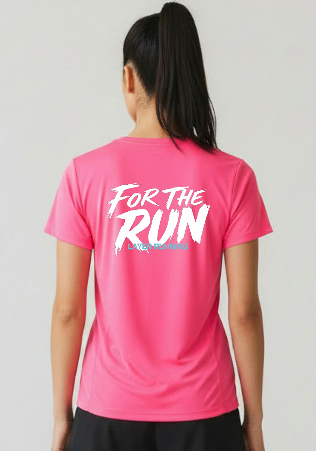 Close-up back detail of the ‘For The Run’ graphic on the pink Layer Women’s FTR Running Tee.