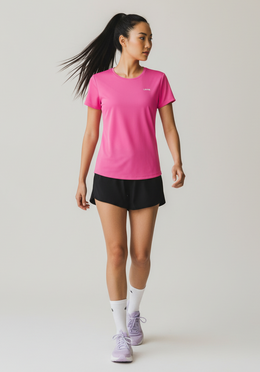 Layer Women's FTR Running Tee in pink, side angle showing athletic fit
