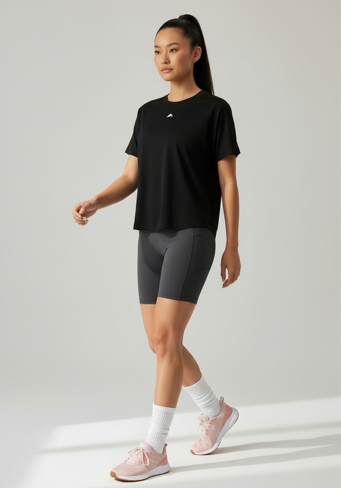 Layer Women's Vento running tee in black, side view

