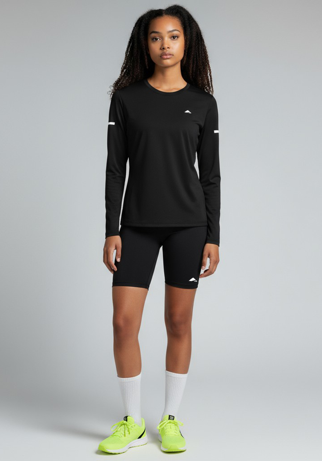 Layer Women’s For The Run Long Sleeve Tee in black – lightweight performance top designed for running and endurance training