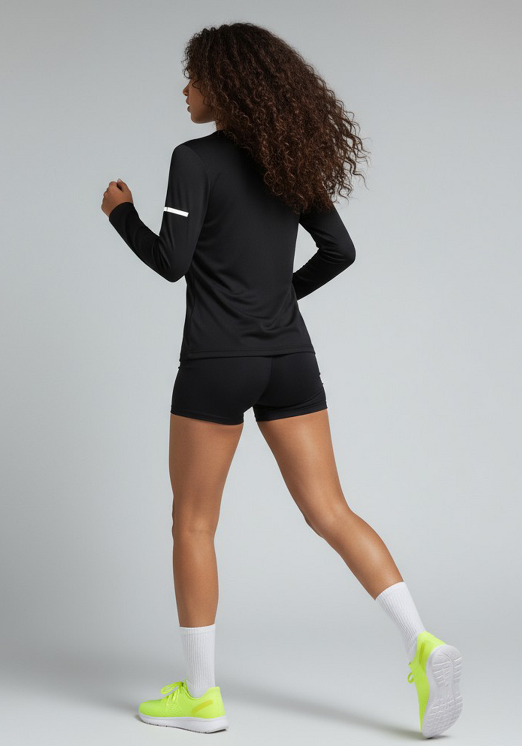 Layer Women’s For The Run Long Sleeve Tee in black – on-model back view showing breathable technical fabric and athletic fit