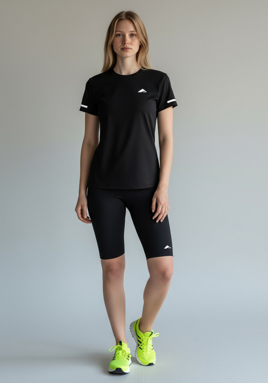 Layer Women’s For The Run Tee in black – lightweight performance T-shirt designed for running and training