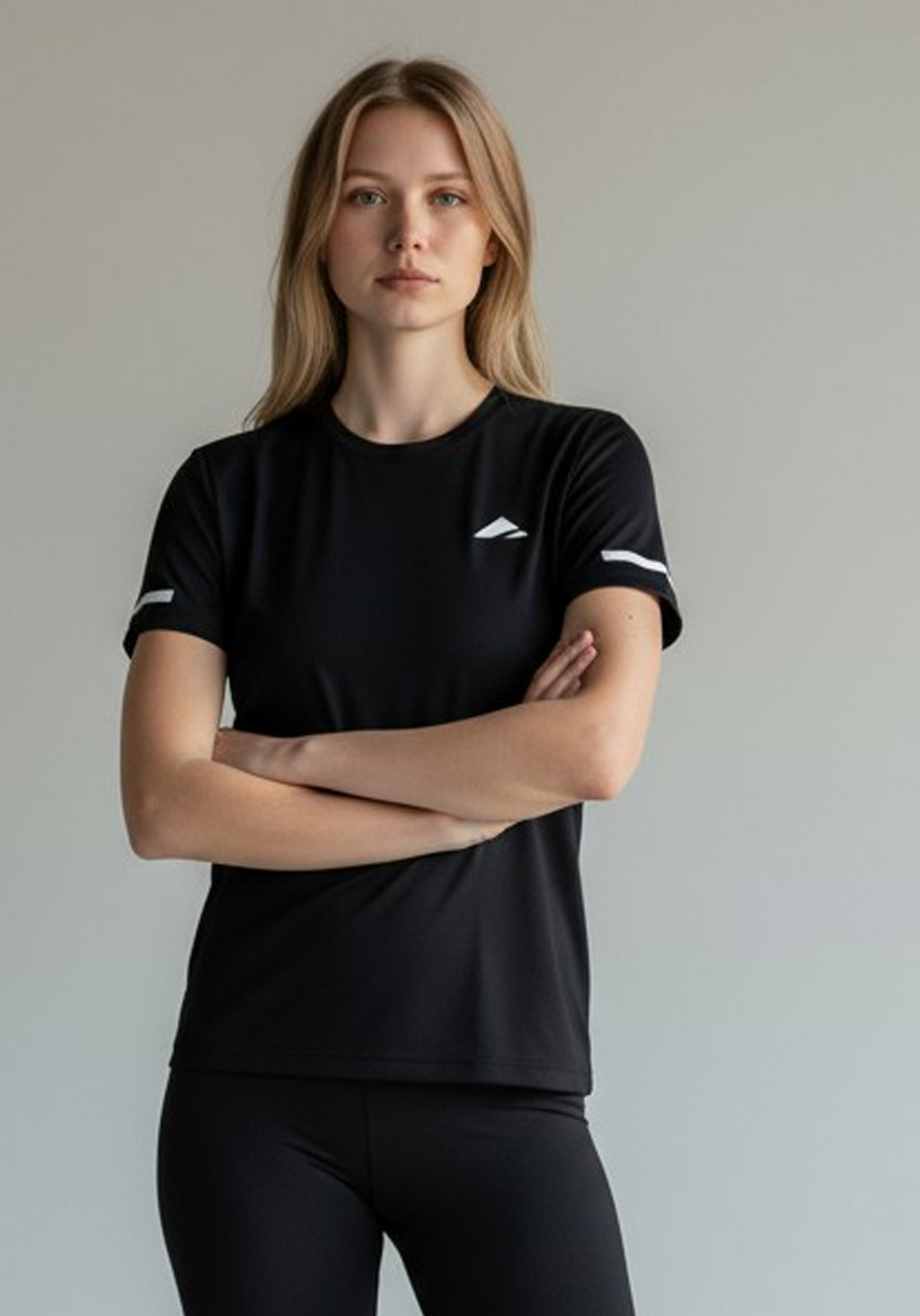 Layer Women’s For The Run Tee in black – close-up front view highlighting soft technical material and subtle Layer logo