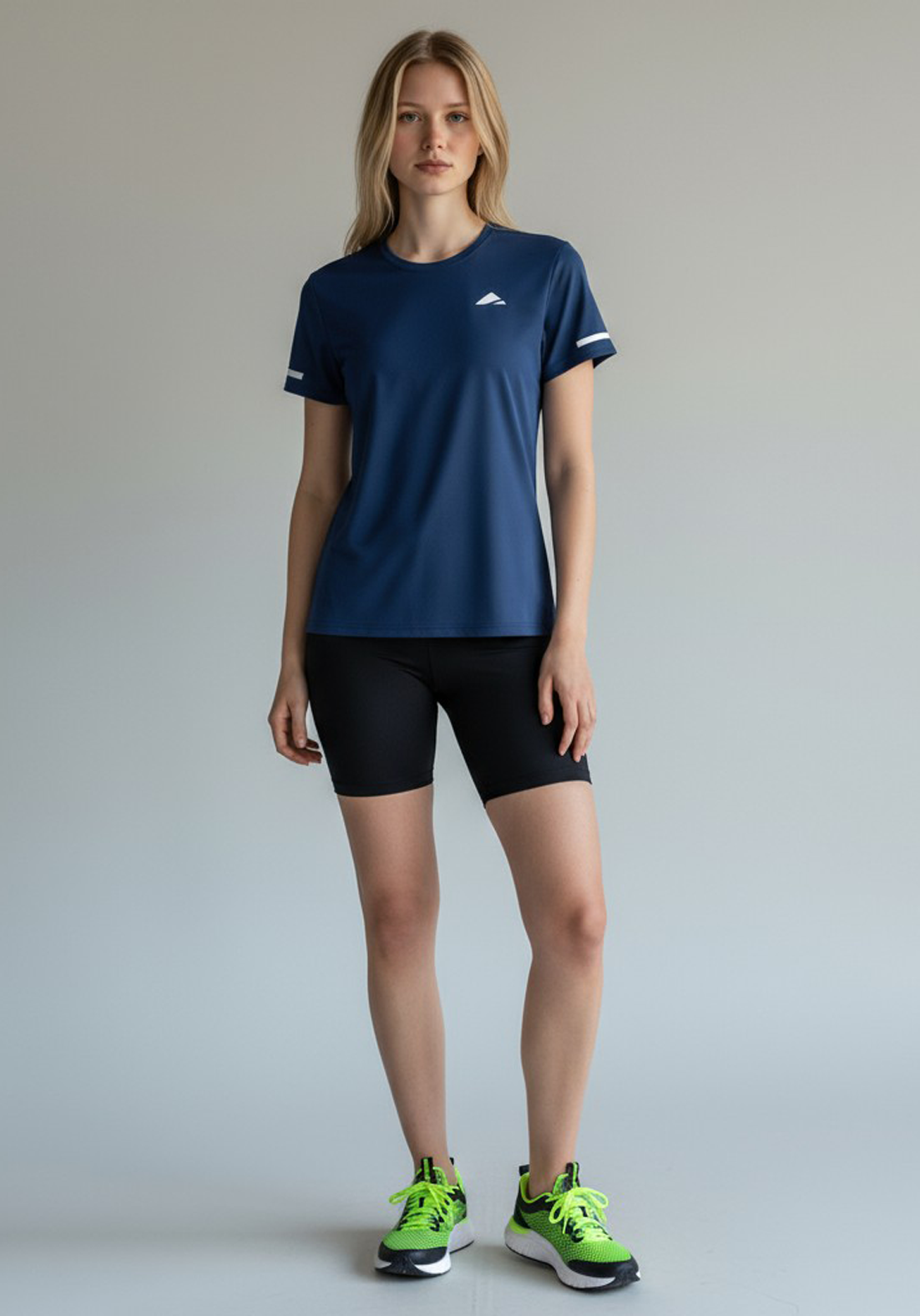 Layer Women’s For The Run Tee in navy – performance running top built for comfort, endurance, and everyday training