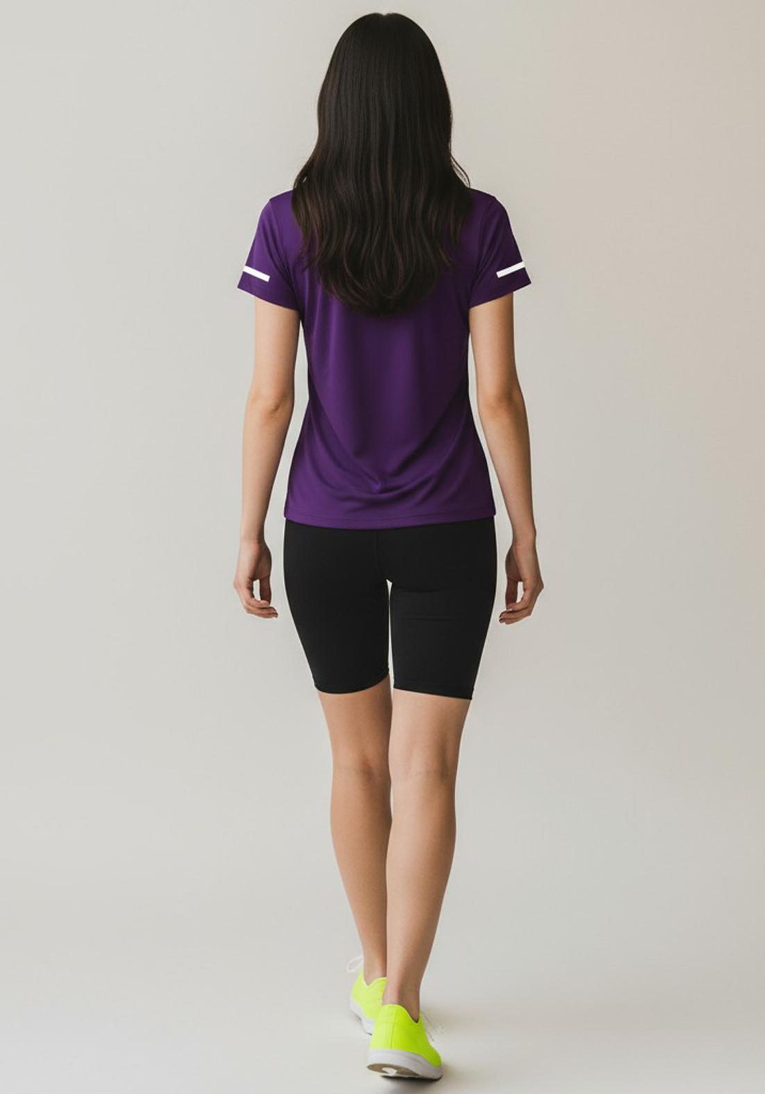 Layer Women’s For The Run Tee in purple – on-model back view showing breathable material and contoured shape