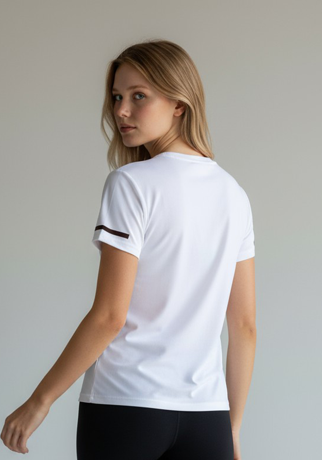 Layer Women’s For The Run Tee in white – close-up back view highlighting performance fabric and comfort fit